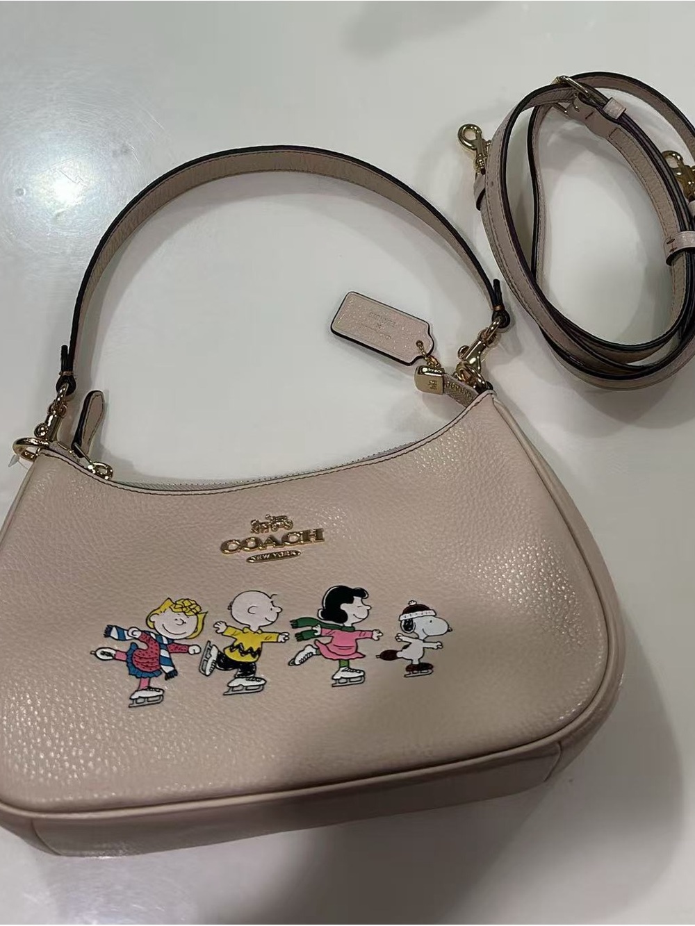 Coach Disney Pebbled Leather Shoulder Bag in Pale Pink with Character Print
